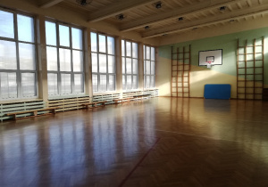 Czysta i przestronna sala gimnastyczna.